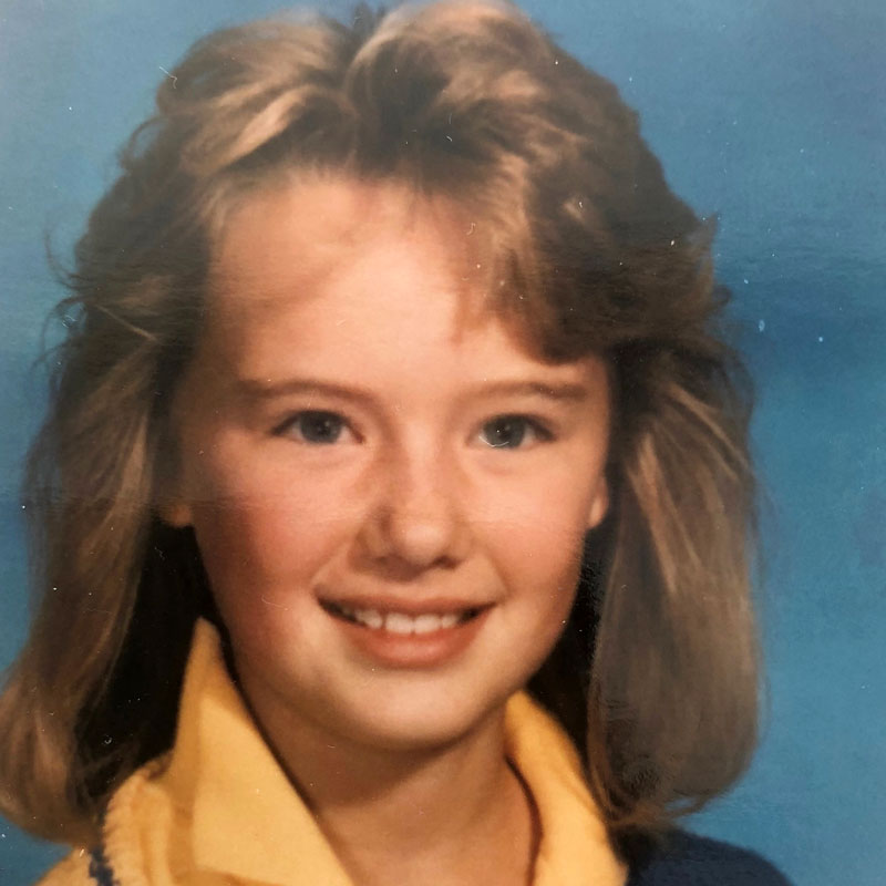 A lady wearing a yellow outfit