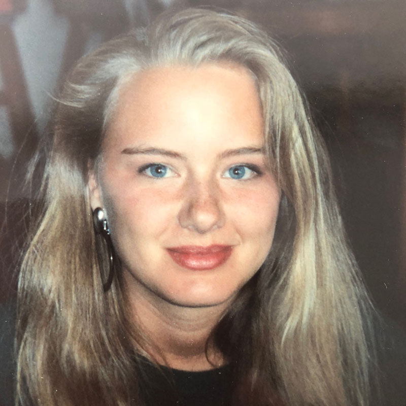 A woman wearing hoop earrings